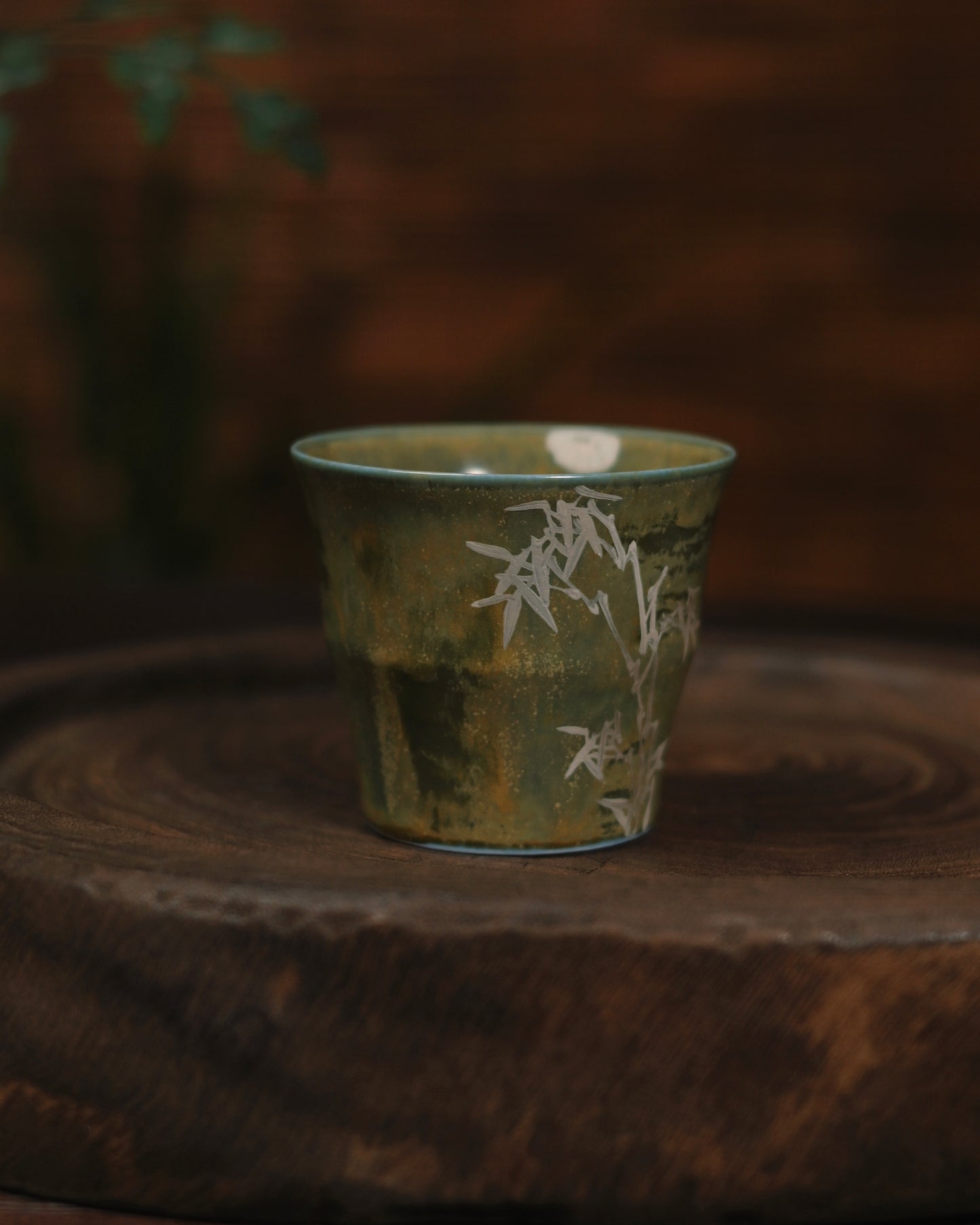 Detailed view of the mug's textured surface, emphasizing the tactile quality created by high-temperature kiln transformation