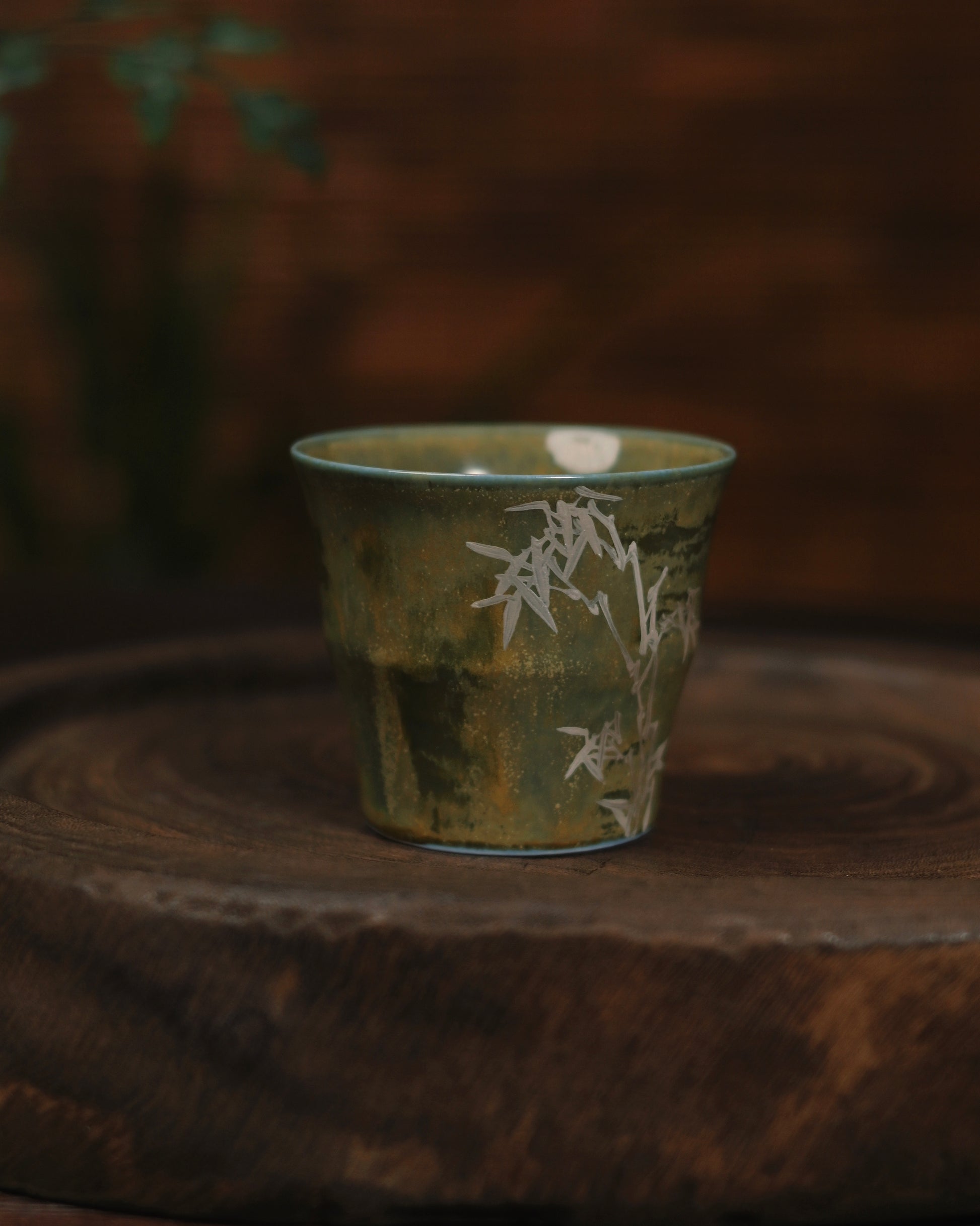 Detailed view of the mug's textured surface, emphasizing the tactile quality created by high-temperature kiln transformation