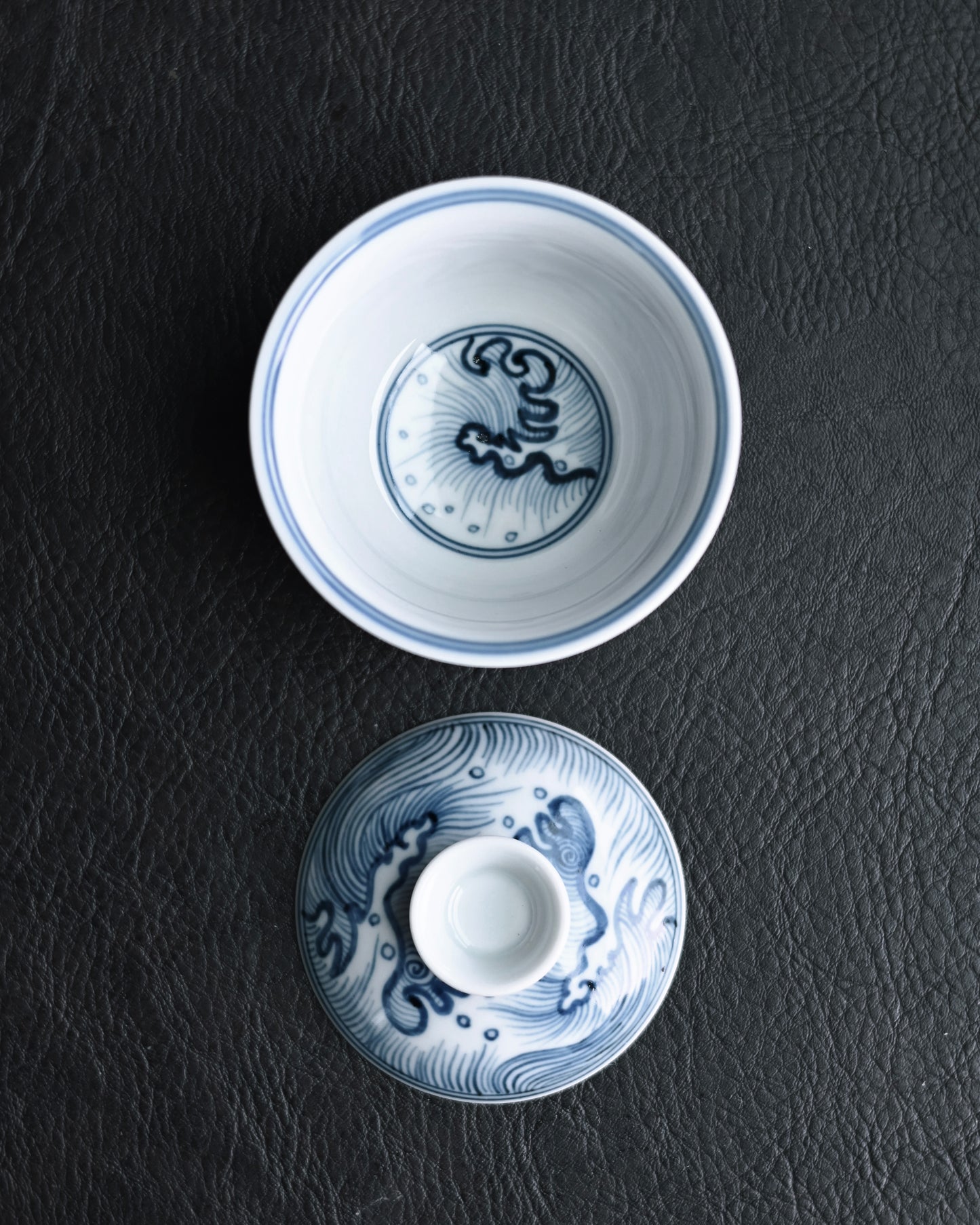 Small lidded tea bowl balancing functional design with historical artistic expression