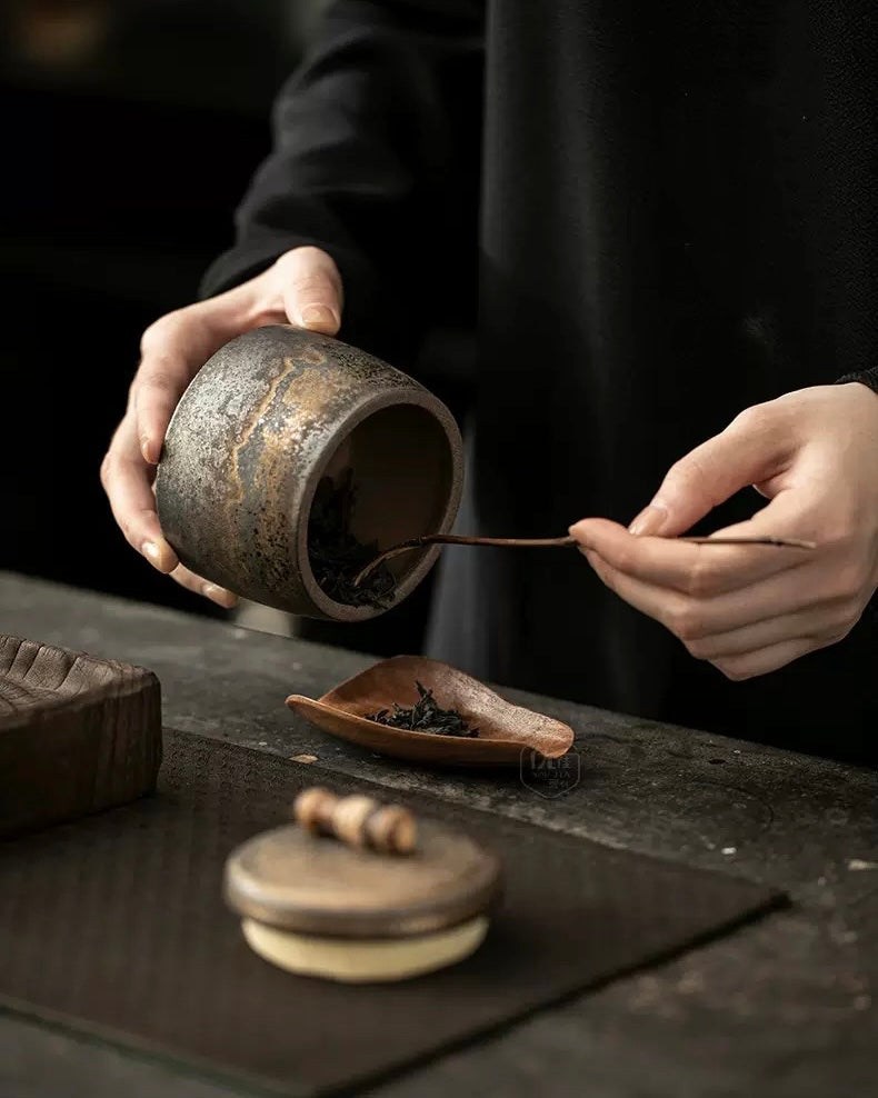 Luxury small tea caddy showcasing vintage Chinese craftsmanship and texture.