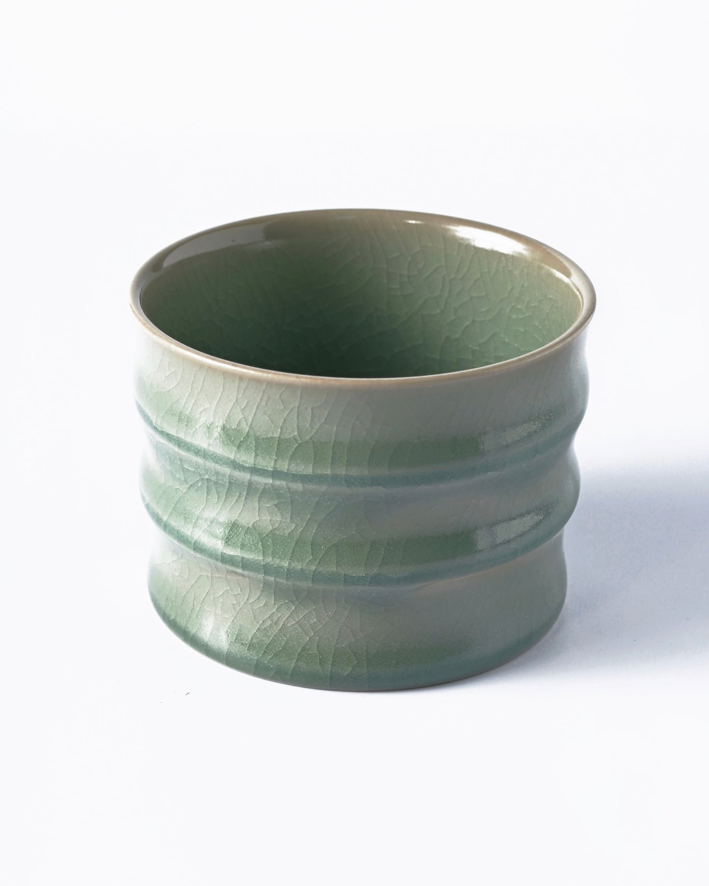 Song Dynasty style Ru celadon master cup with bamboo-inspired form and intricate crackle network patterns