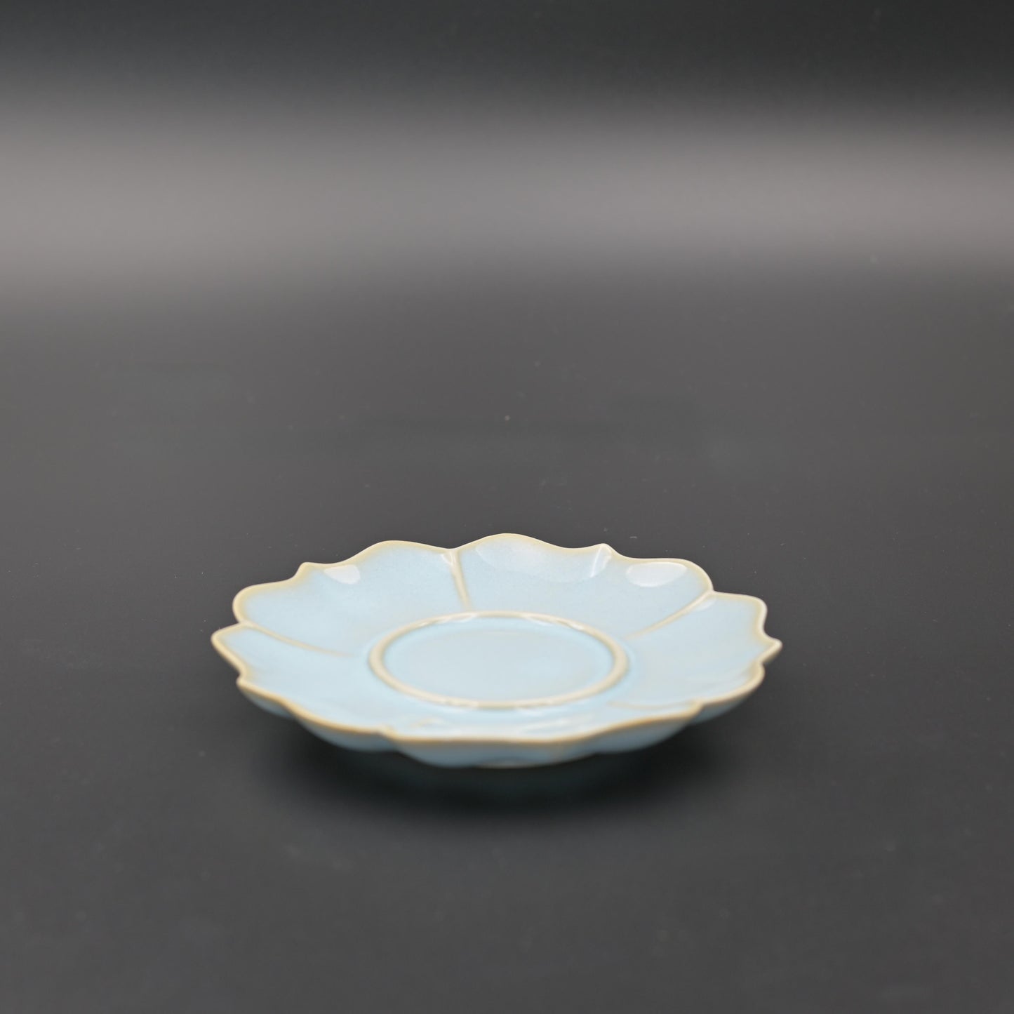 Traditional Ru ware style saucer with fluted sunflower edge and celestial blue glaze, perfect for tea ceremony use and cup protection