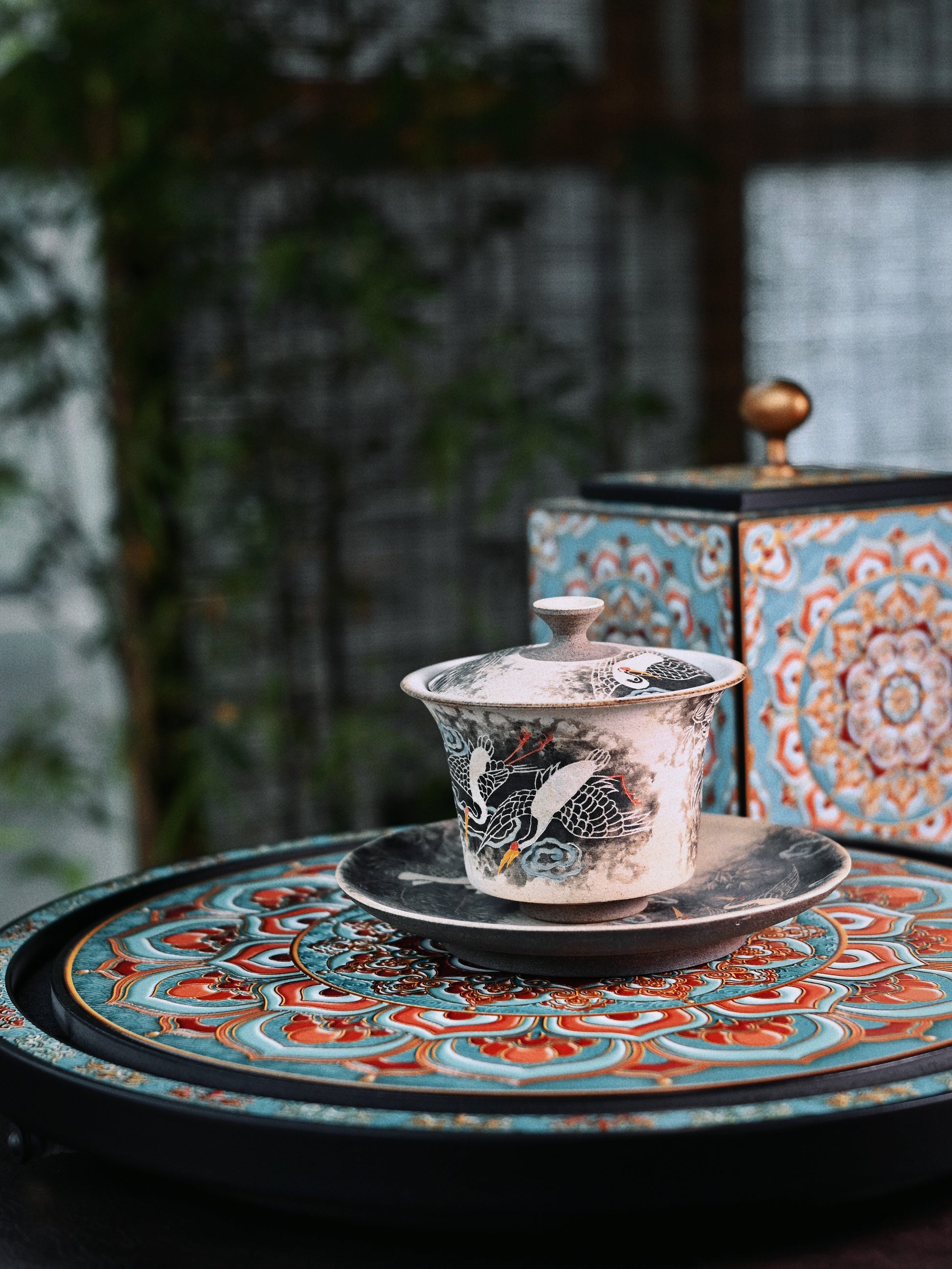 Close-up of Dunhuang mural inspired patterns on bamboo charcoal fiber tea tray