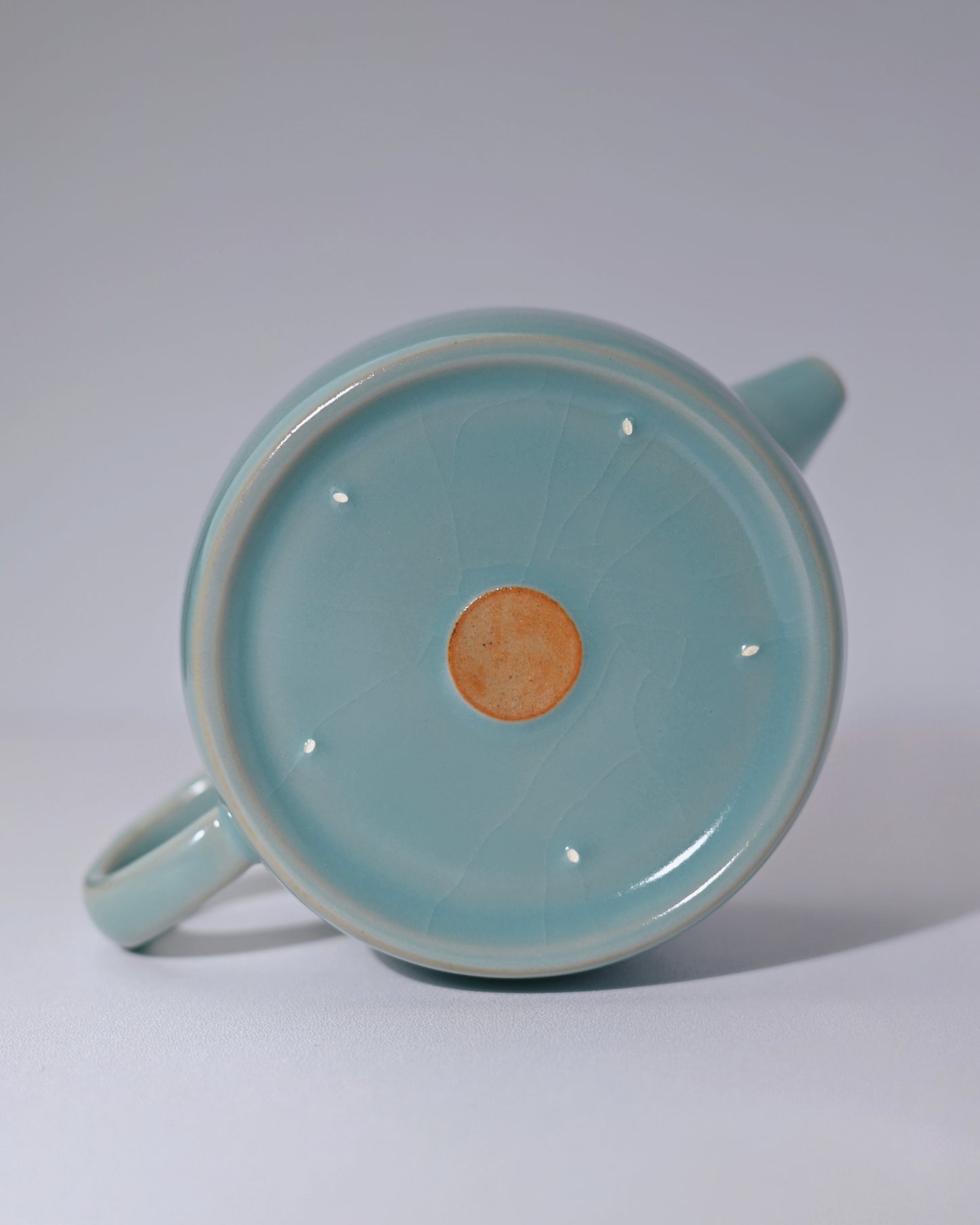 Naturally tea-stained crackle patterns forming unique golden-brown veins over time