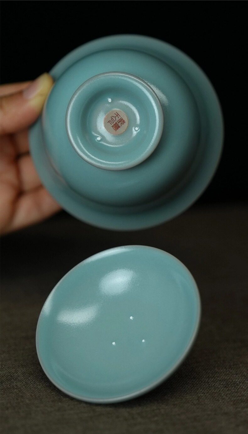 Gongfu tea setup featuring Ru Ware sky-blue 120ml Qingying Gaiwan on traditional tea table