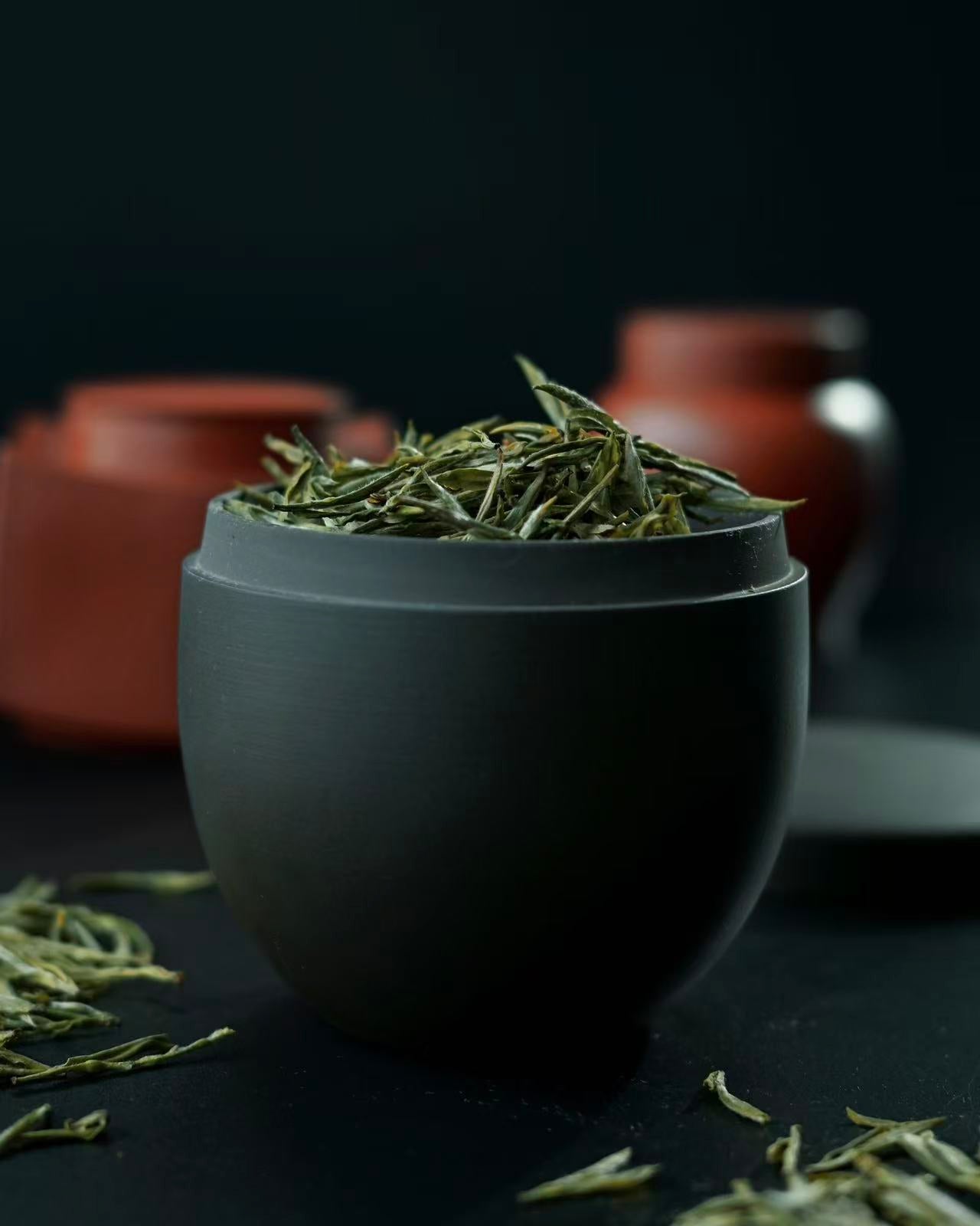 Portable Yixing tea storage jar with simple elegance, 250ml capacity ideal for traveling tea enthusiasts