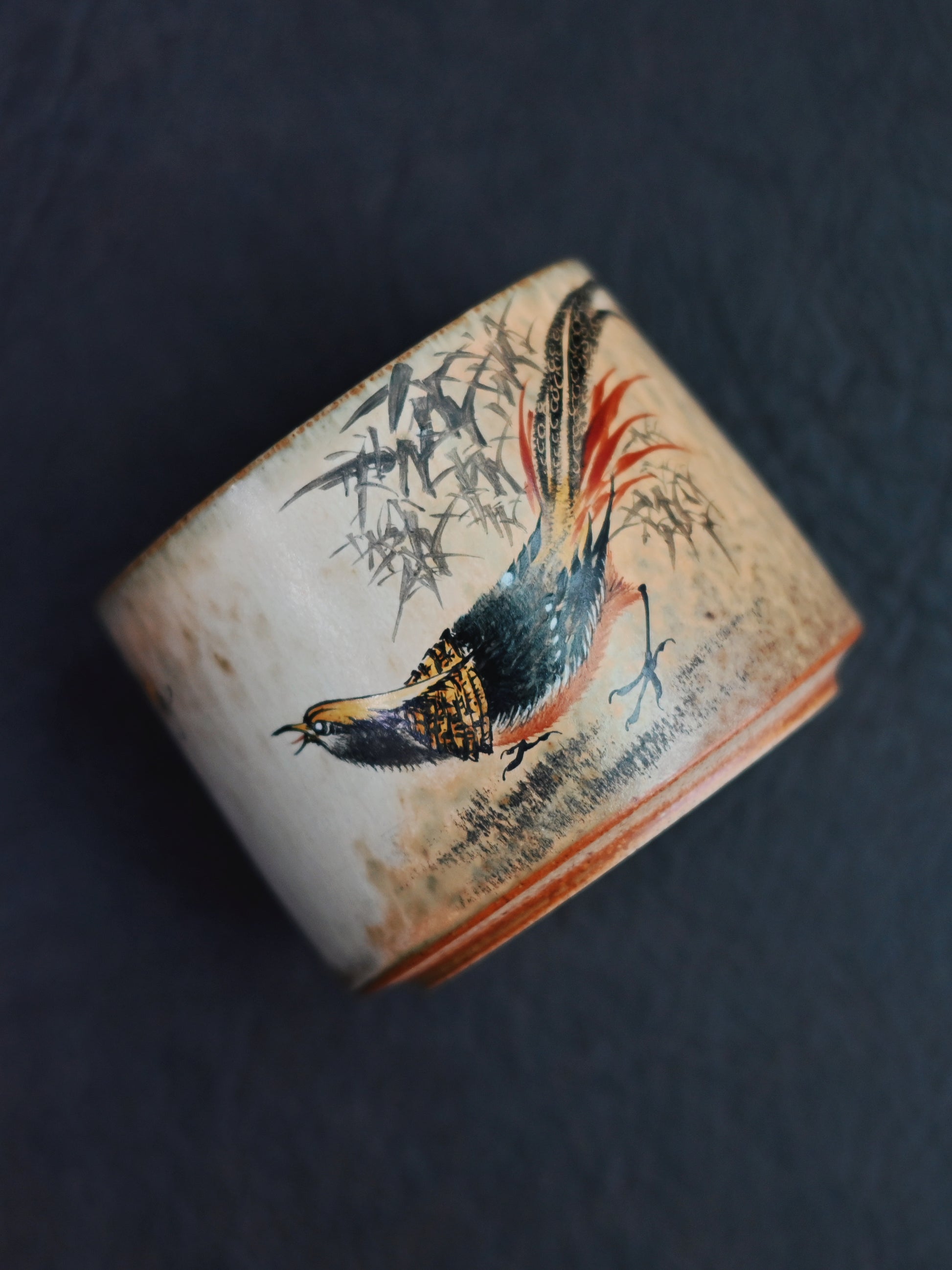 Jingdezhen fully hand-thrown and hand-painted teacup in classic Chinese bird-and-flower style, featuring vintage-inspired artistry and meticulous brushwork.