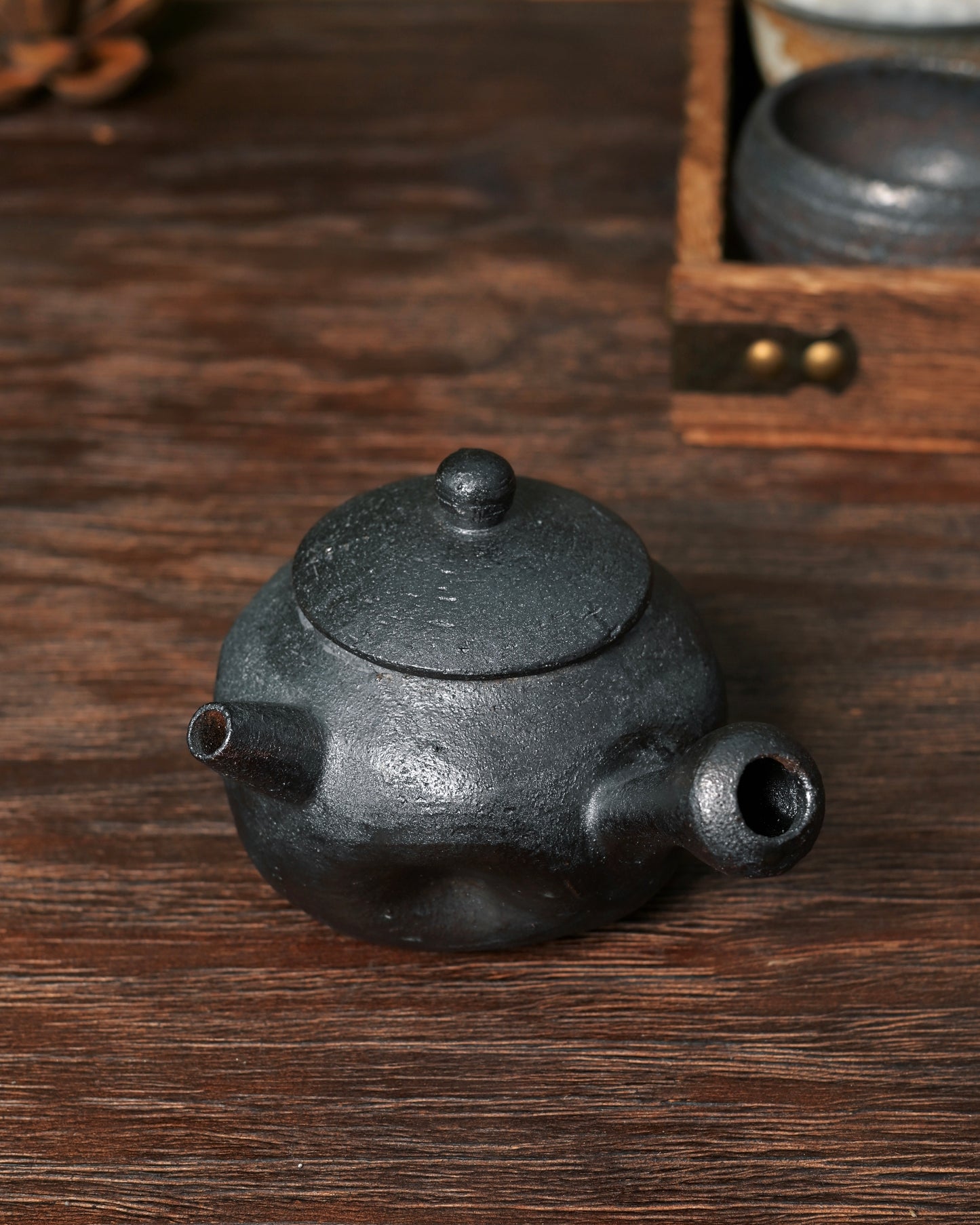 Natural ash markings on pottery surface from direct flame exposure during firing