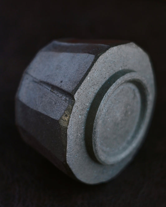 Wood-fired surface with fine crackle patterns and natural ash glaze effects