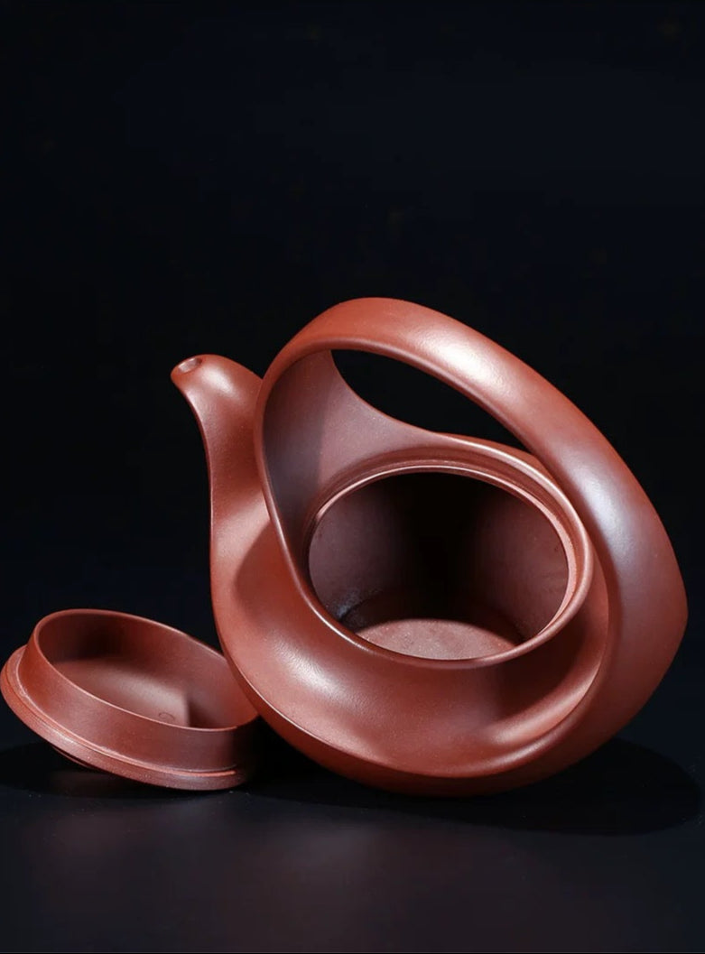1:1 scale Qu Pot replica with original snail-inspired design, crafted by Yang Junbao in premium Zisha clay