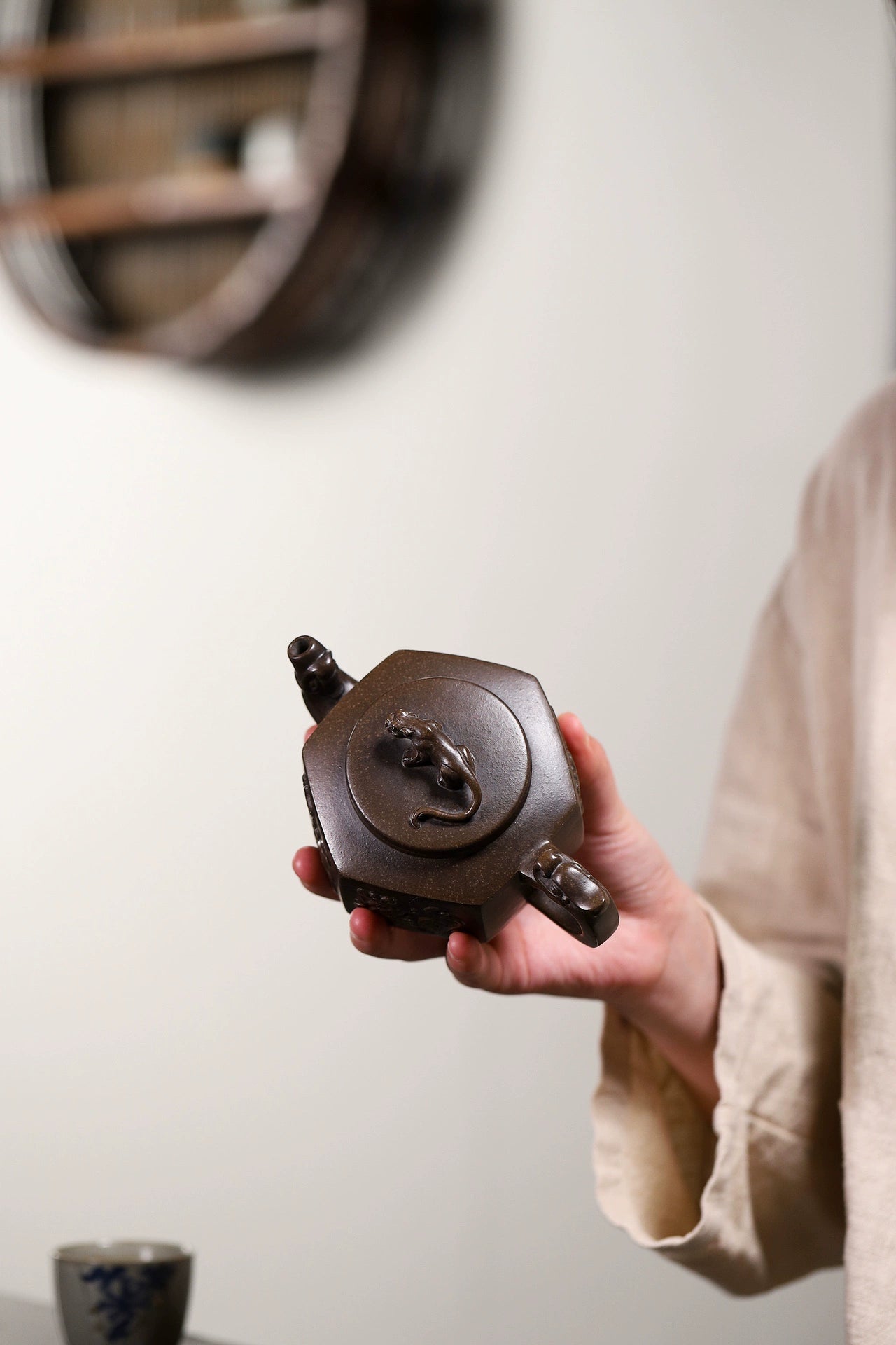 Close-up of Hexagonal Teapot with Four-sided Dragon Totem Carvings