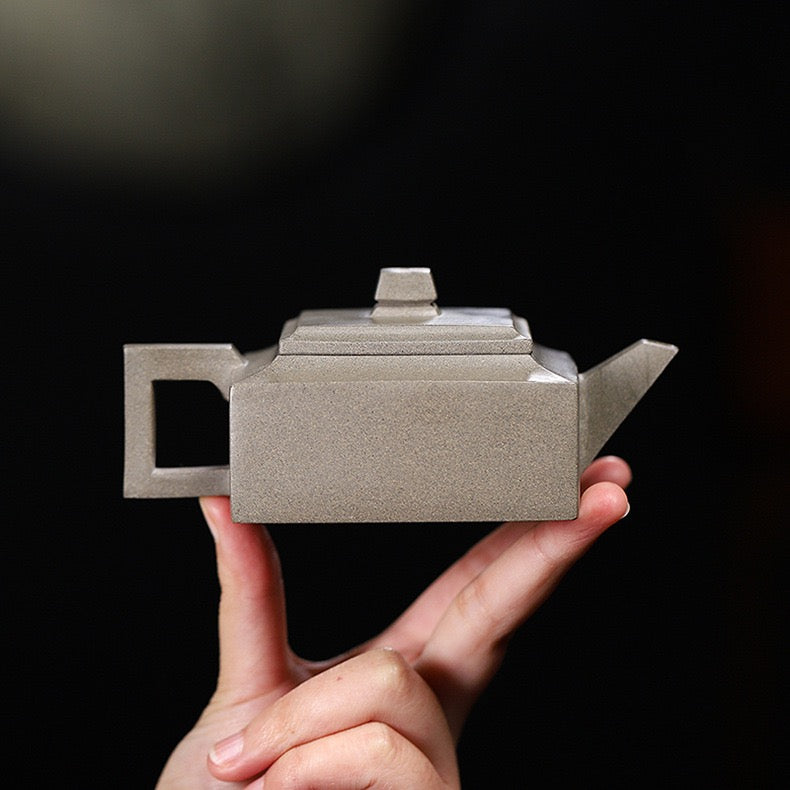 Yixing green-grey Duan clay teapot with excellent heat retention, perfect for multiple infusions of Tieguanyin