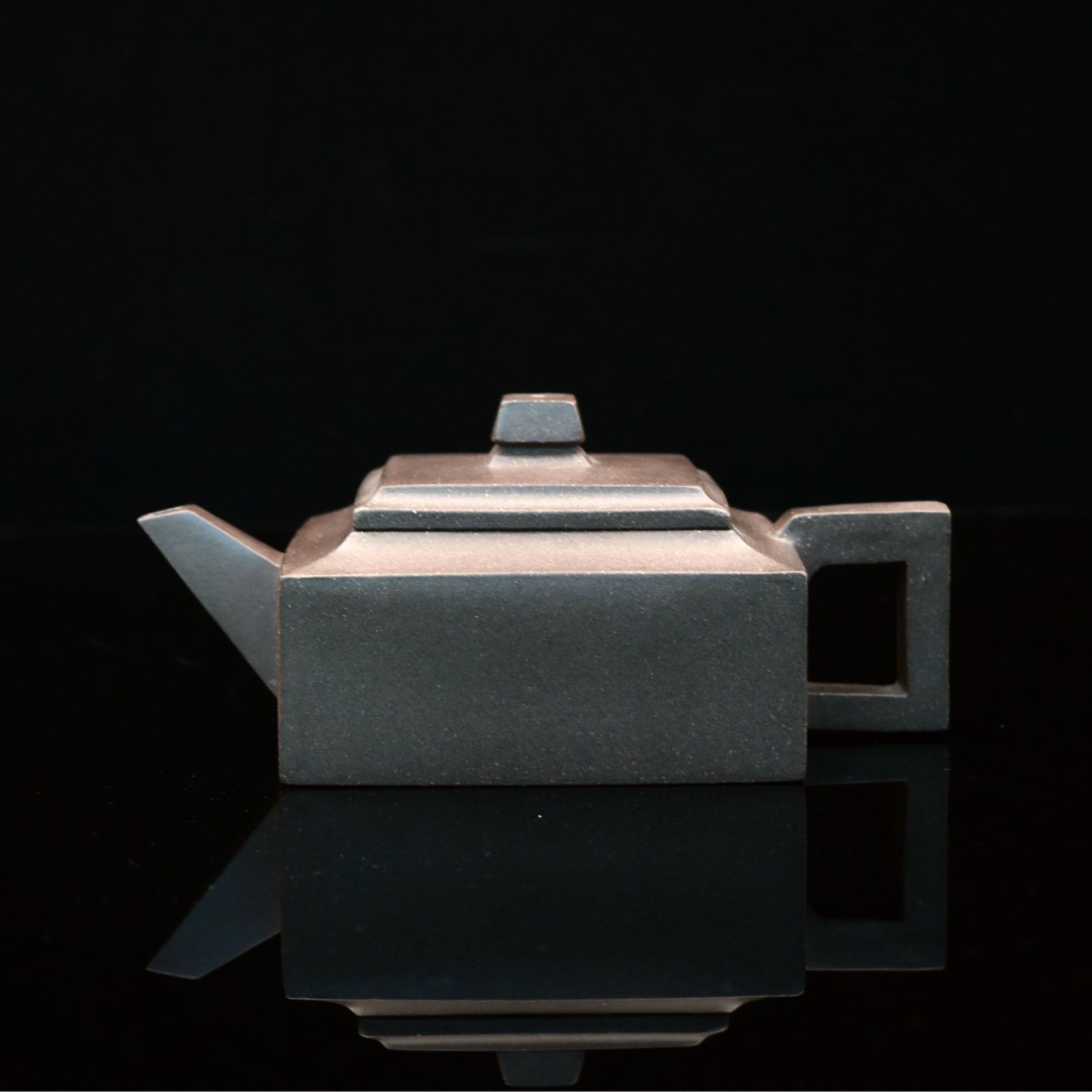 Handmade Yixing zisha teapot crafted from rare Qinghui Duan clay, ideal for gongfu tea ceremony