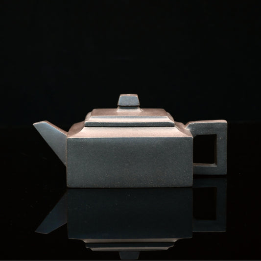 Handmade Yixing zisha teapot crafted from rare Qinghui Duan clay, ideal for gongfu tea ceremony