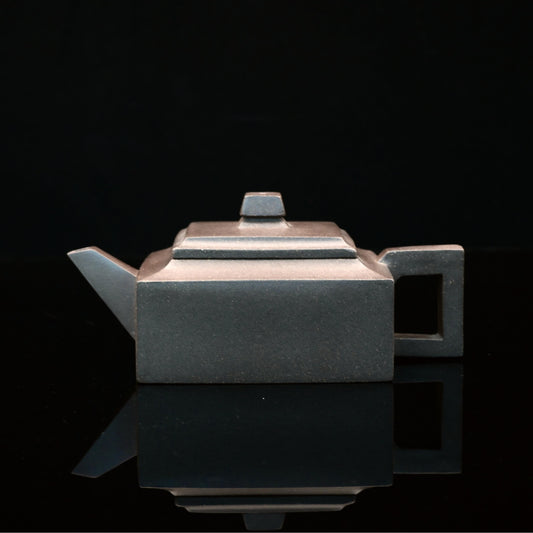 Handmade Yixing zisha teapot crafted from rare Qinghui Duan clay, ideal for gongfu tea ceremony