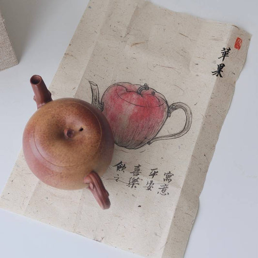Yixing Zisha Duanni teapot with apple-inspired design