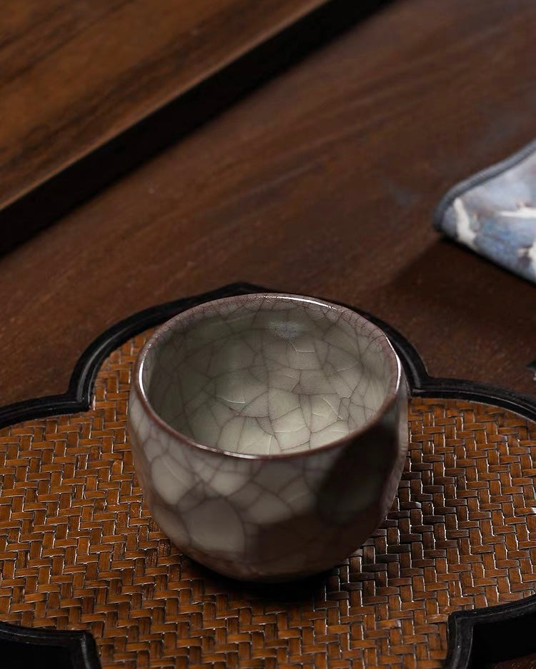 Northern Song handmade Ge ware with natural iron body visible at unglazed foot rim areas