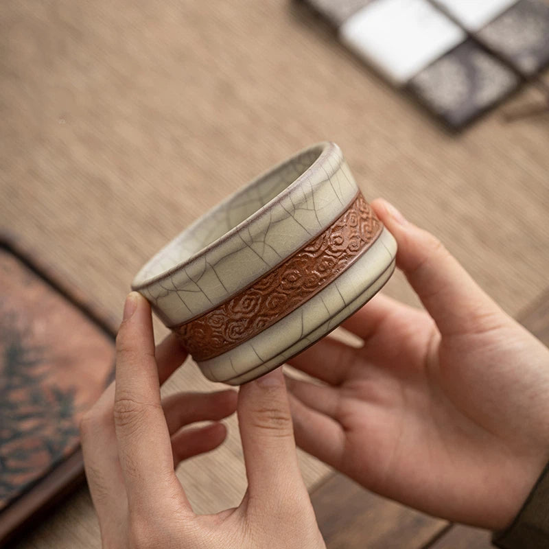 Longquan Celadon Ge Kiln Crackle Carved Hand Teacup