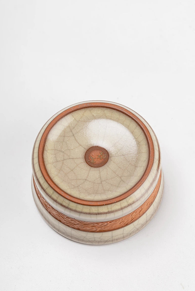 Longquan Celadon Ge Kiln Crackle Carved Hand Teacup