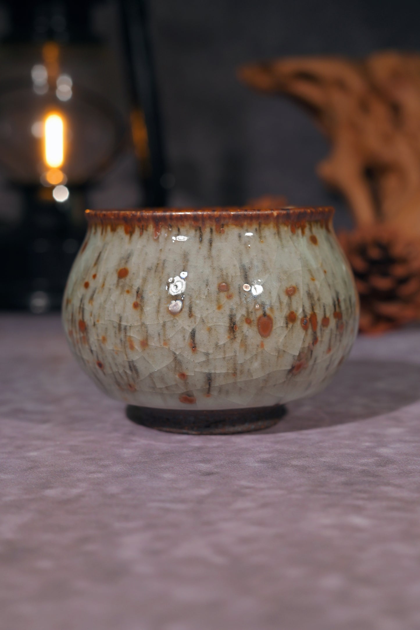 Tactile Shino-ware tasting cup with scorched earth aesthetic and elegant lip feel.