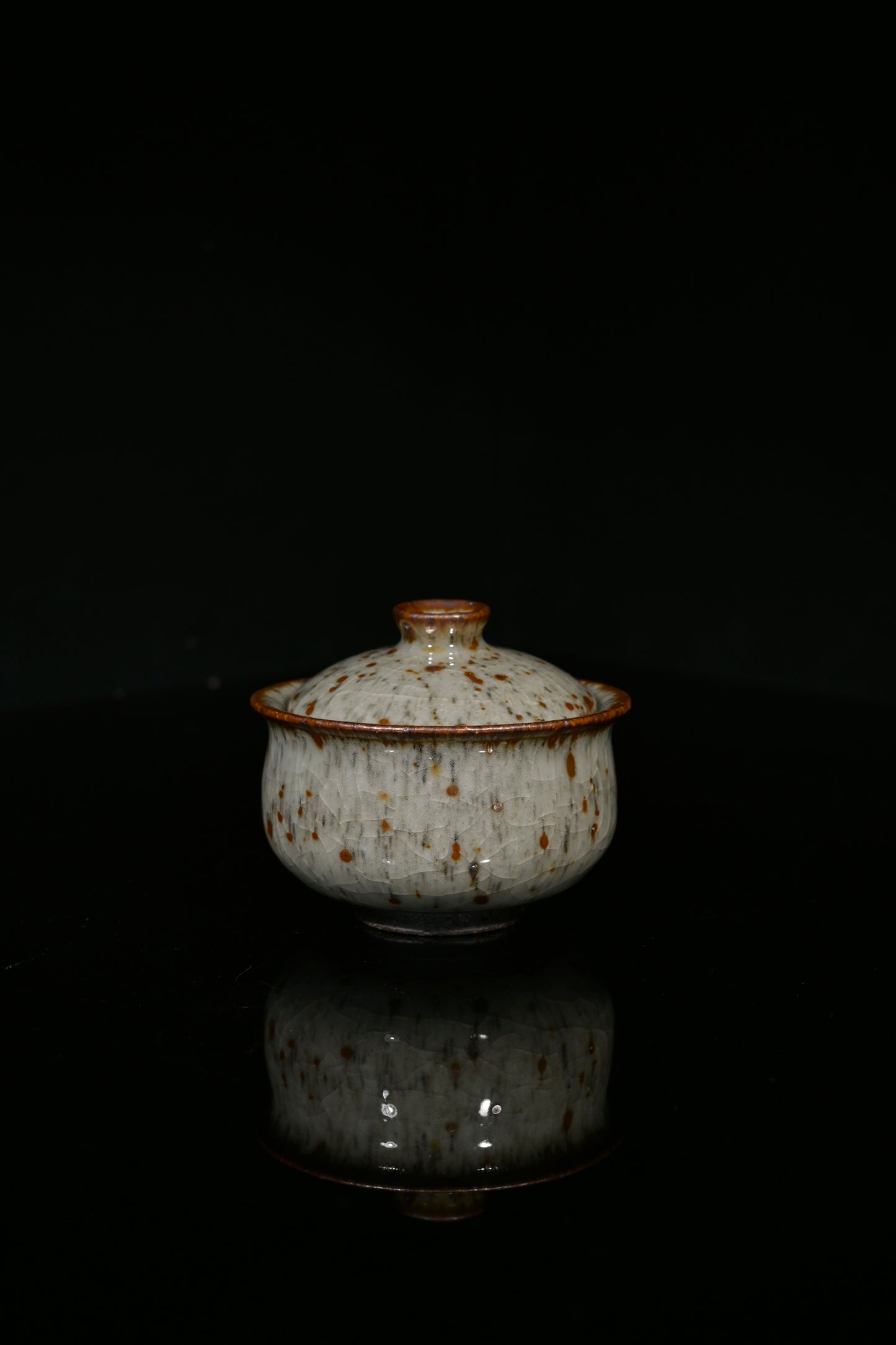 Artisan-made Shino porcelain tea set featuring a rustic "Leopard Rain" glaze texture.