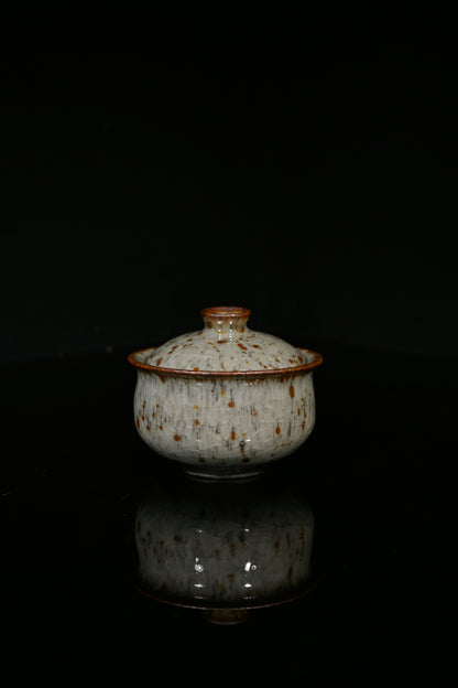 Artisan-made Shino porcelain tea set featuring a rustic "Leopard Rain" glaze texture.