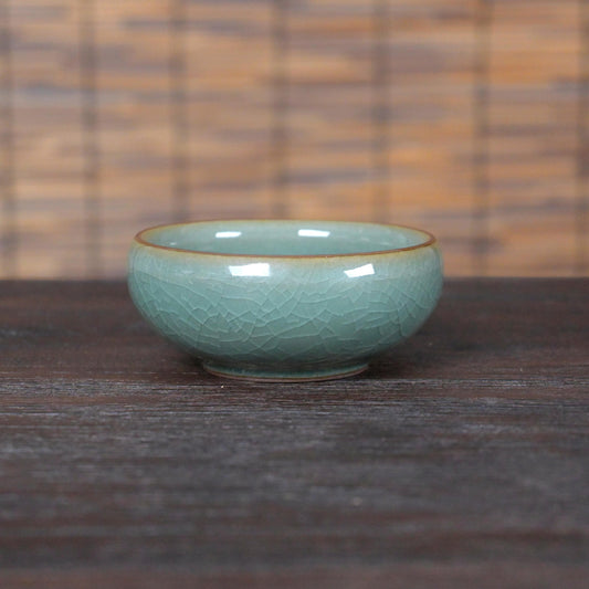 Longquan celadon Ge kiln plum green "Little Fish" Gongfu tea cup.