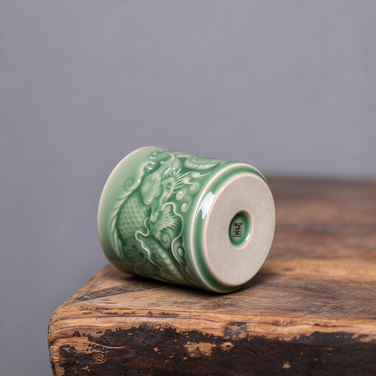 Artisanal Longquan Celadon dragon embossed porcelain teacup designed for Gongfu tea tasting