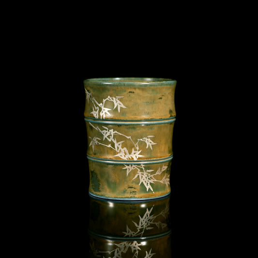 Front view of the 'Bamboo Rhythm' ceramic mug from Jingdezhen, featuring a minimalist bamboo design hand-painted with metallic accents