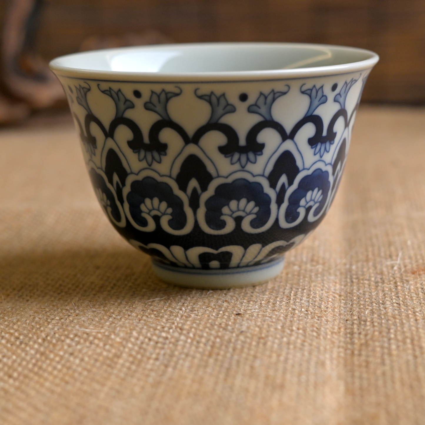 Blue and White Lotus Scrolling Pattern Cup with Baoxiang Design