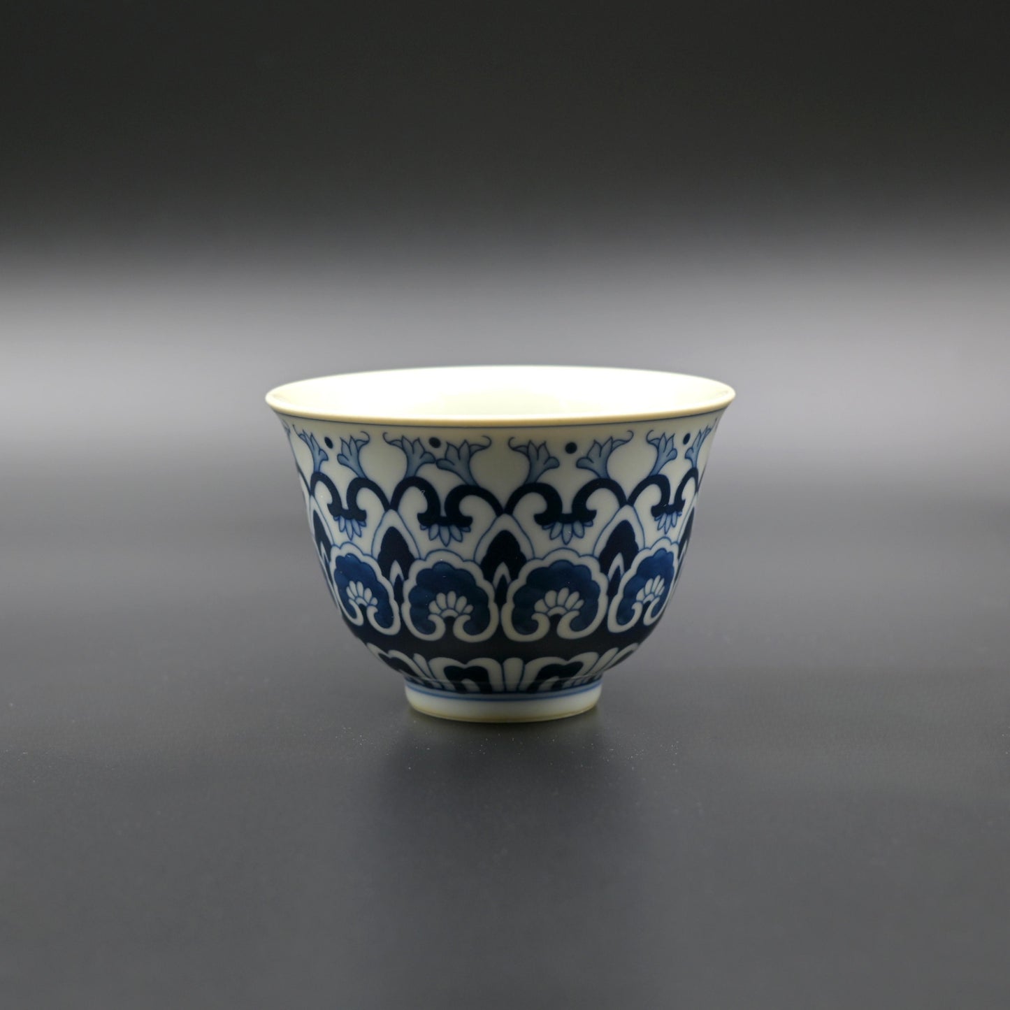 Blue and White Lotus Scrolling Pattern Cup with Baoxiang Design