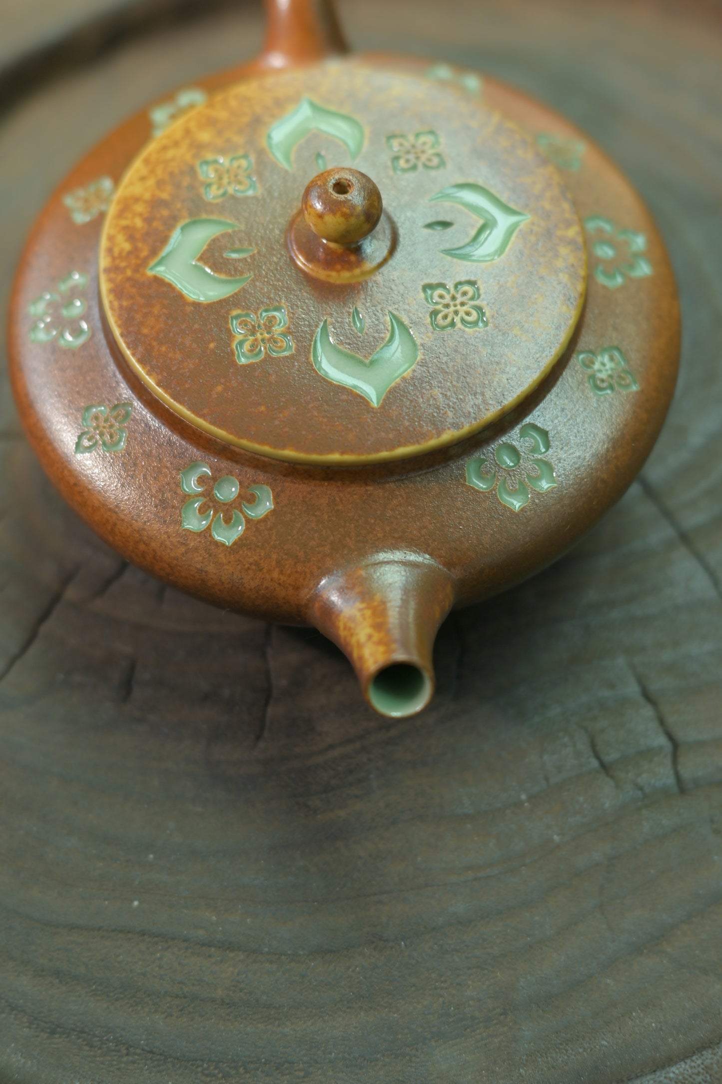 Investment-grade Longquan celadon teapot with traditional ash glaze and relief carving