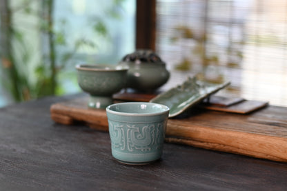Coupe de maître Céladon Longquan bleu céleste à six phénix totem