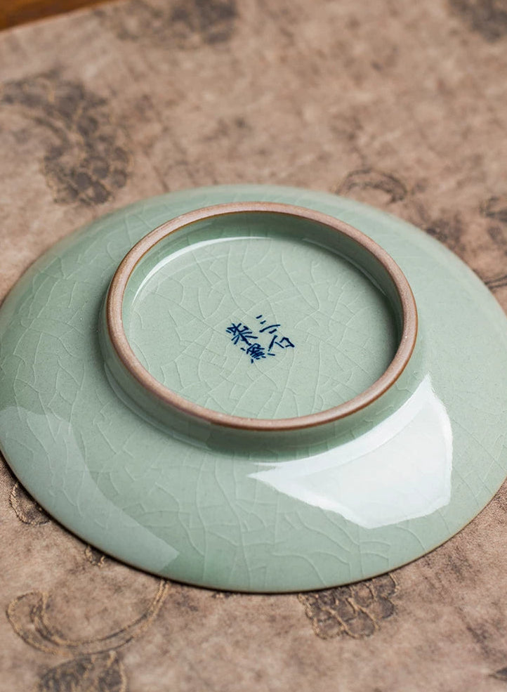 Detailed view of the crystalline glaze and hand-painted artistry on a 170ml tea vessel.