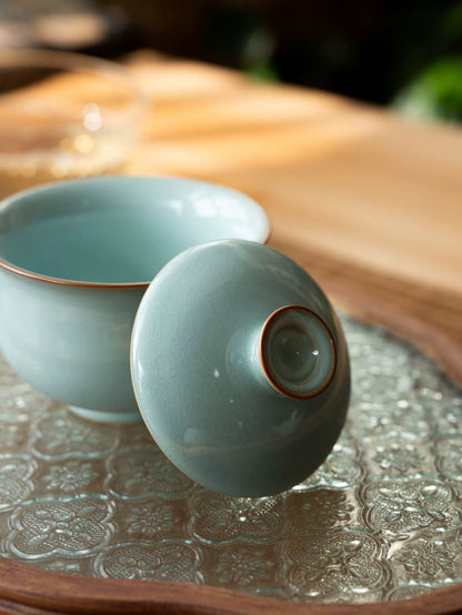 Top view of sky-blue Ru Ware gaiwan showing intricate crackle lines