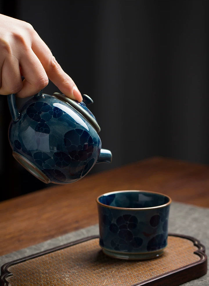 High-quality porcelain teapot for Puerh and Oolong tea lovers, showcasing classic Qinghua aesthetics.