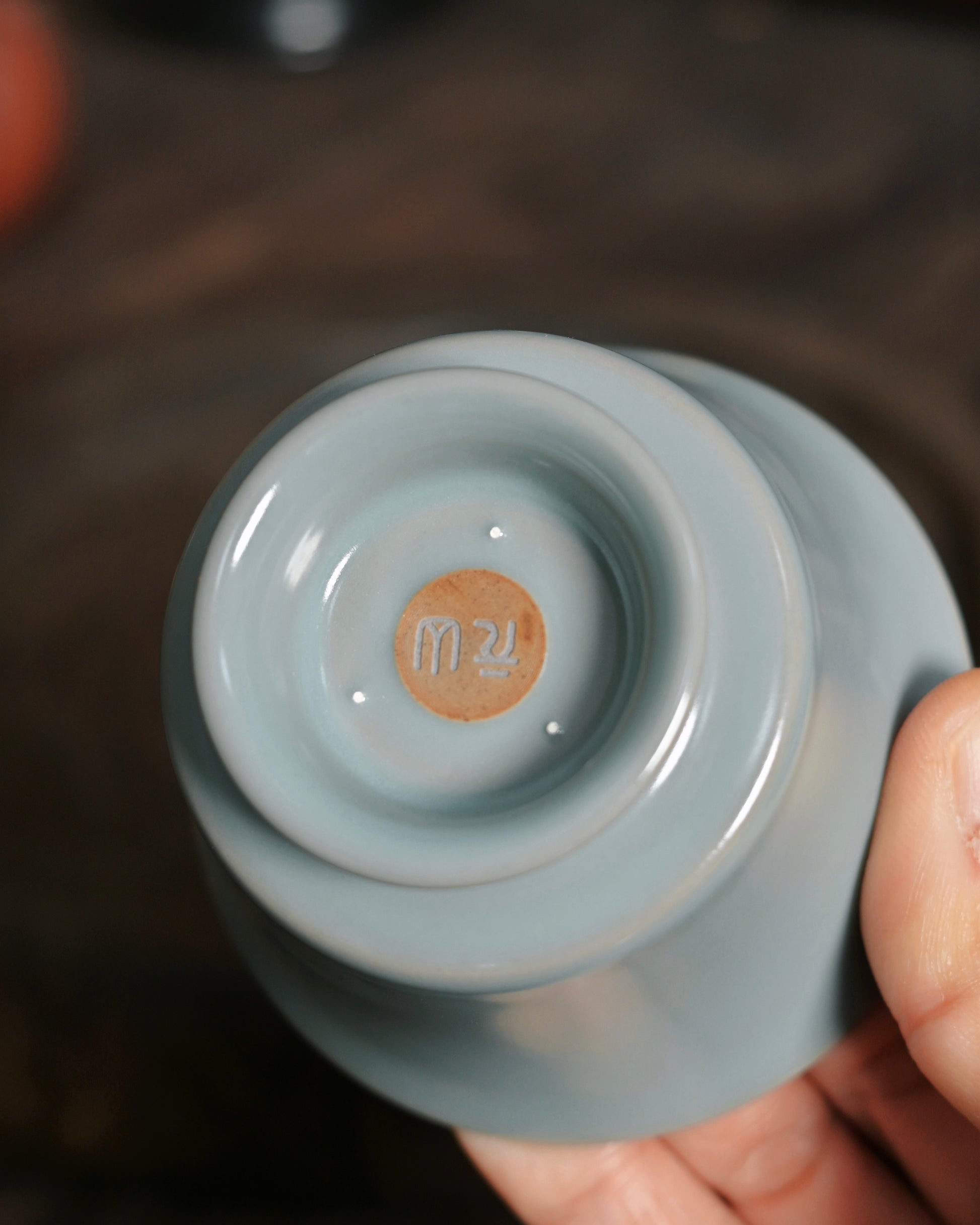 Agate-infused Ruyao celadon glaze creating smooth sky-blue surface with luminous depth