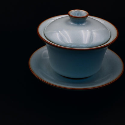 Collectible Ru porcelain gaiwan featuring agate-infused sky-cyan glaze, handcrafted traditional Chinese celadon tea vessel