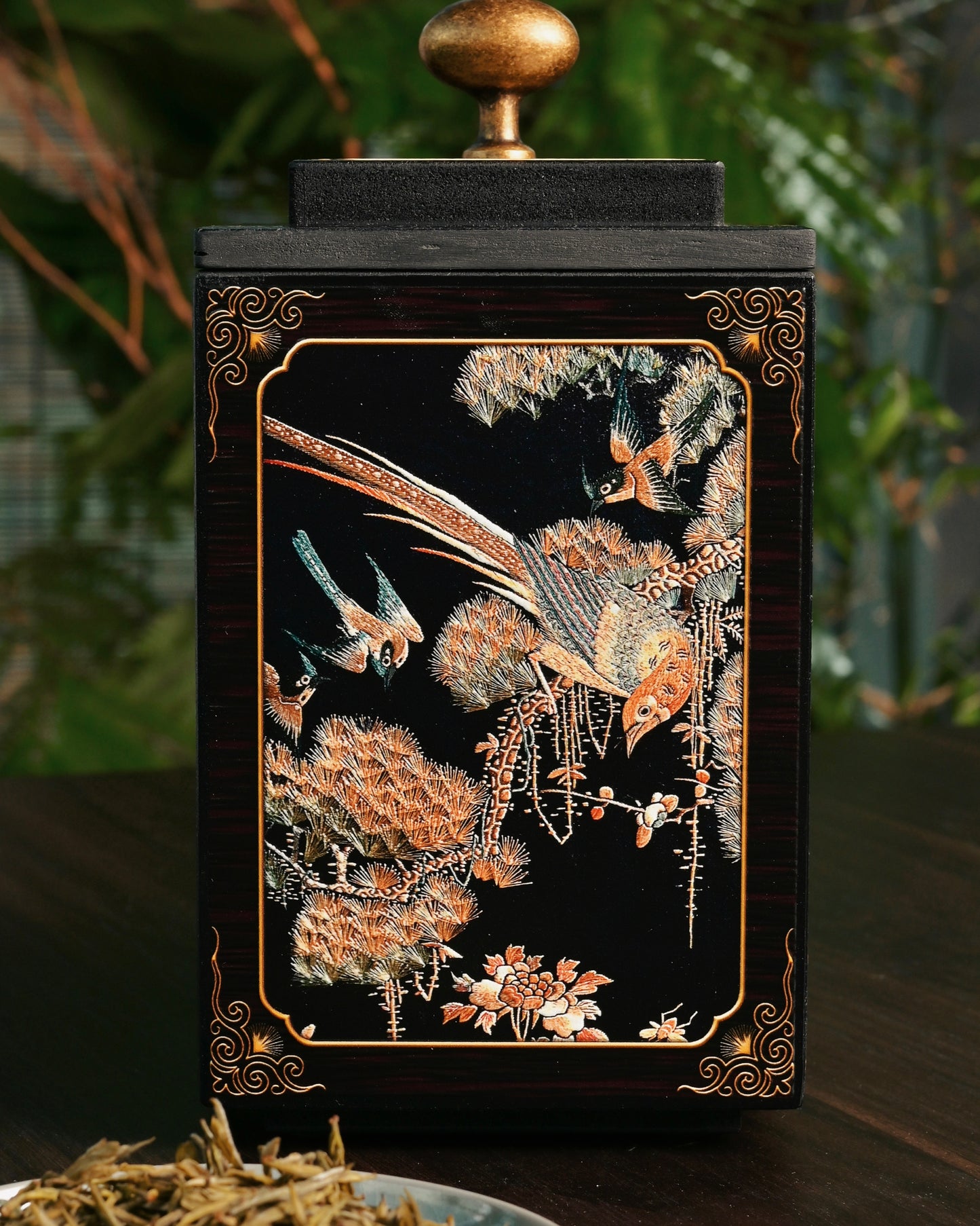 Traditional Chinese tea caddy featuring golden age scene with hundred birds paying homage to phoenix
