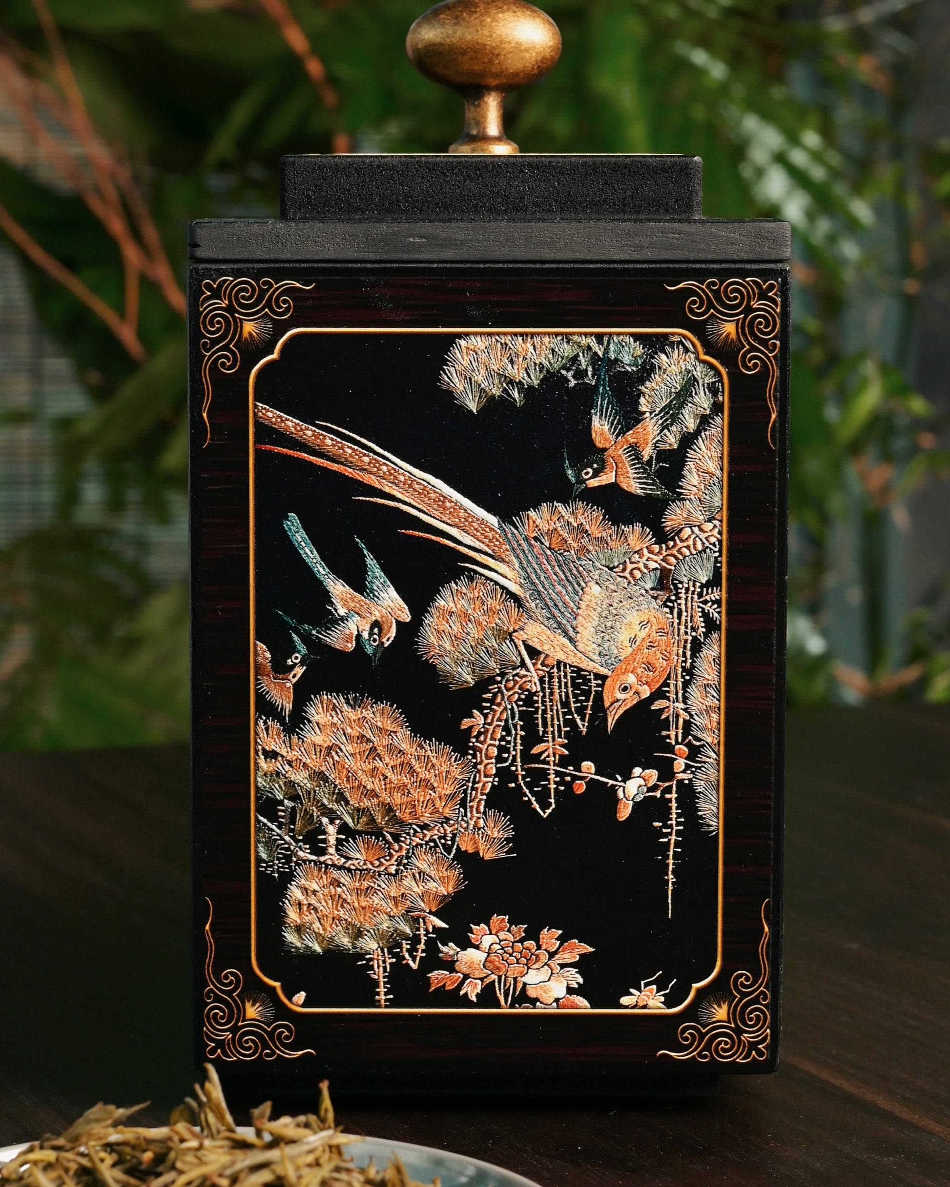 Traditional Chinese tea caddy featuring golden age scene with hundred birds paying homage to phoenix