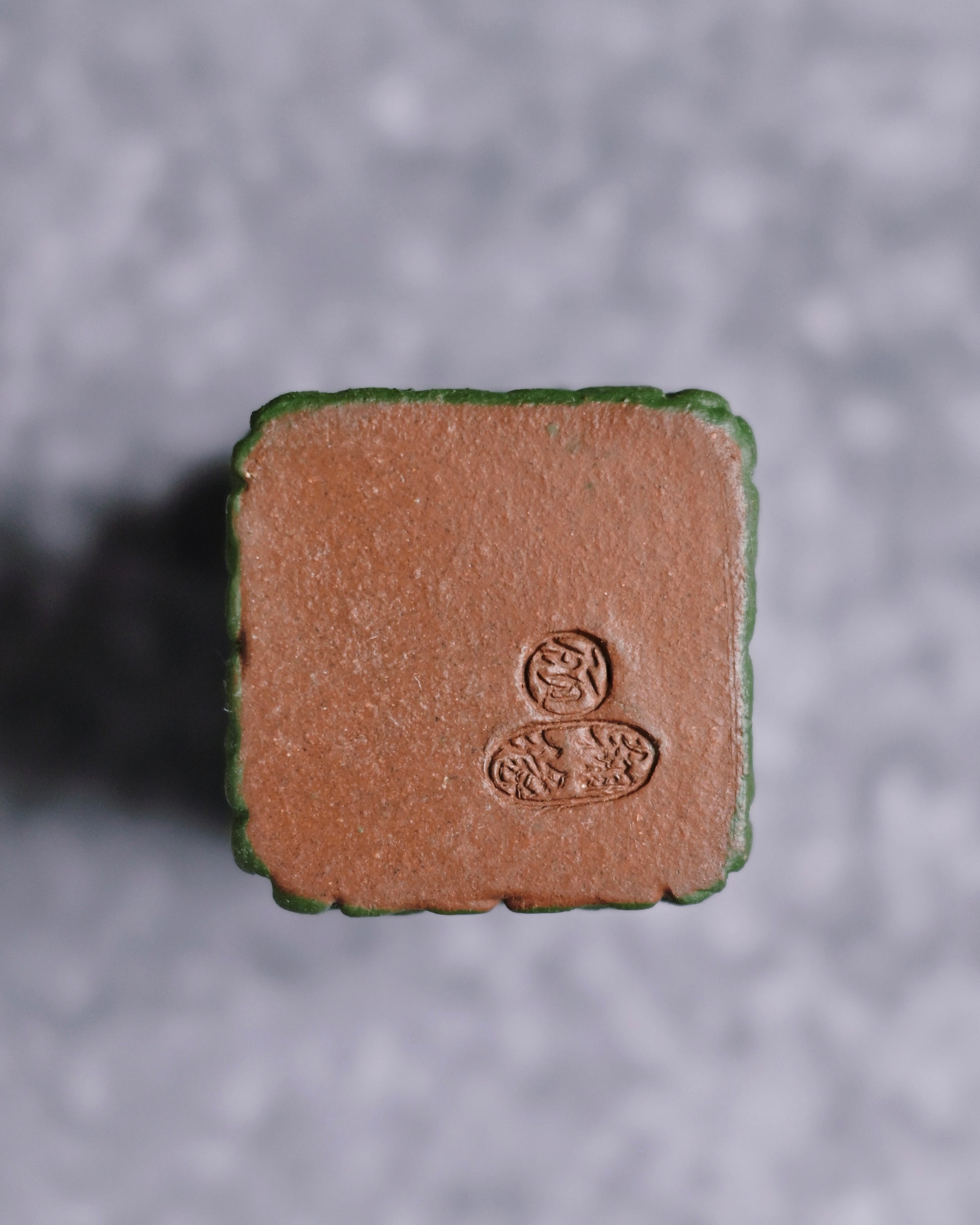 Archaic bronze style gai zhi featuring ancient protective beast imagery adapted for tea table use