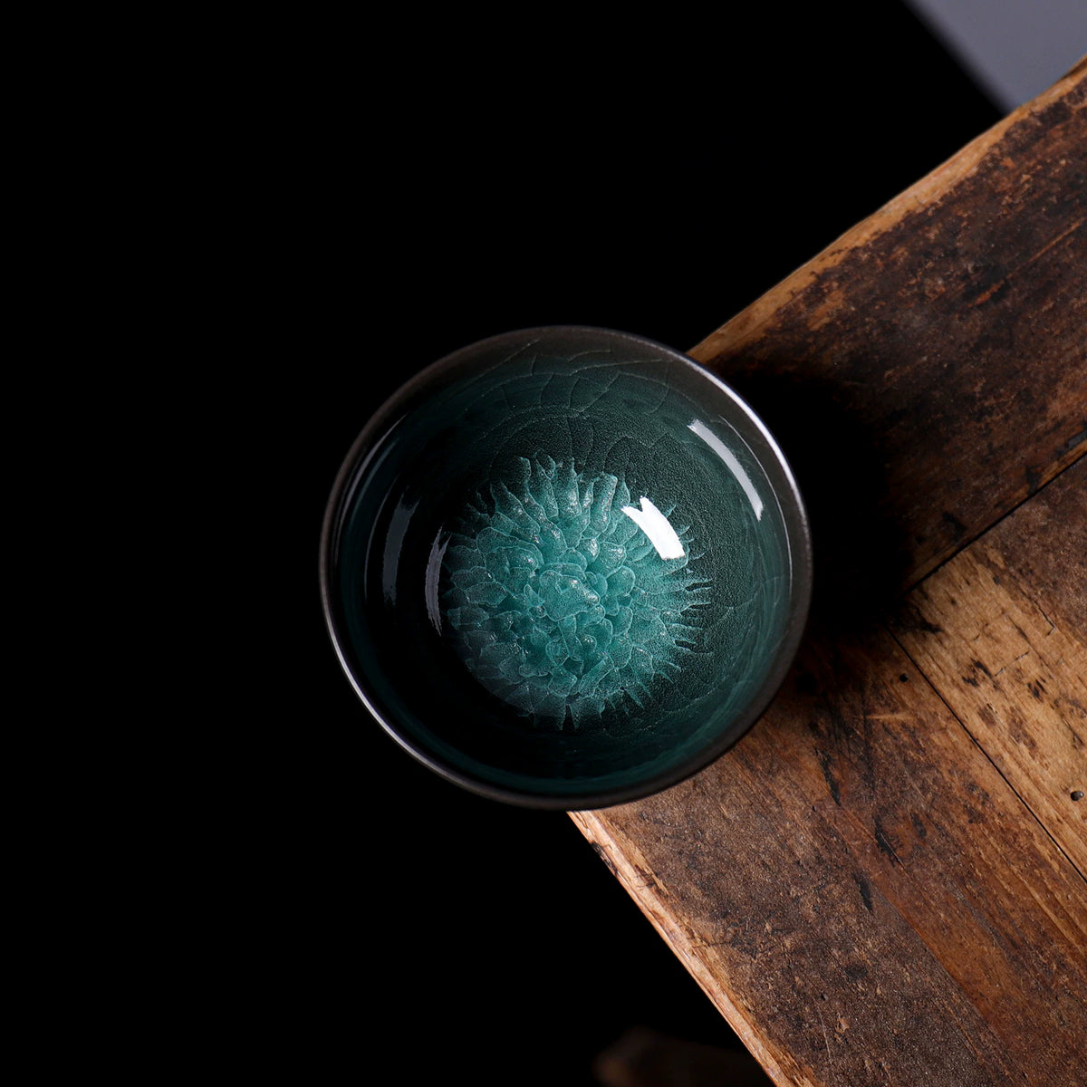 Close-up of 3D ice blossom crystalline glaze pattern inside 135ml Longquan Ge Kiln teacup