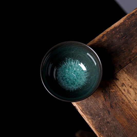 Close-up of 3D ice blossom crystalline glaze pattern inside 135ml Longquan Ge Kiln teacup