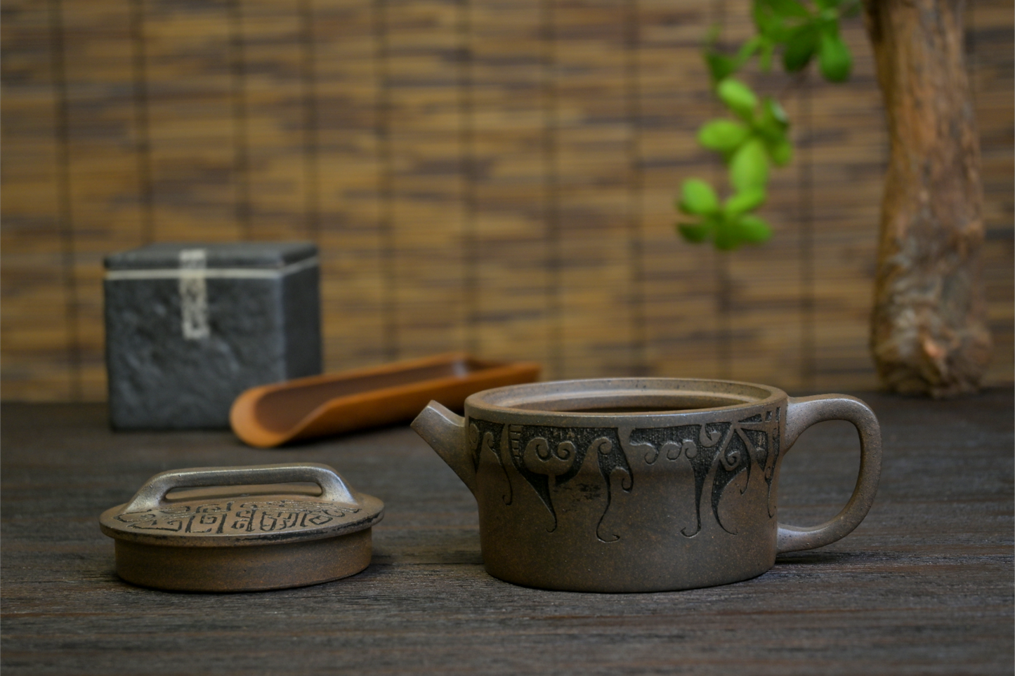 Artist-signed Yixing teapot with hand-carved vintage patterns, featuring seals on lid, bottom and interior surfaces