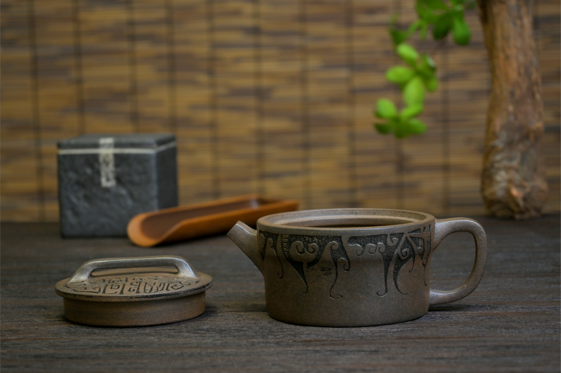 Artist-signed Yixing teapot with hand-carved vintage patterns, featuring seals on lid, bottom and interior surfaces