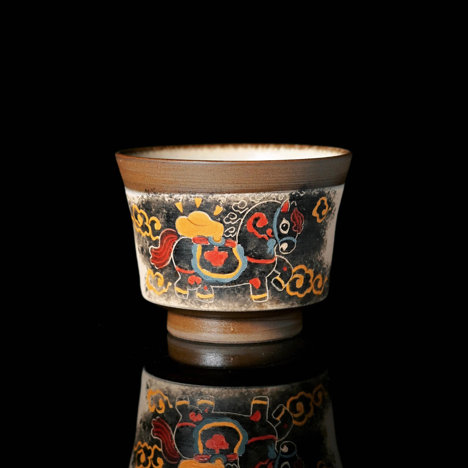 Jingdezhen handcrafted teacup featuring Chinese ink wash style painting of an auspicious pony motif