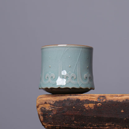 Handmade Longquan Celadon master cup displaying jade-like matte glaze texture and micro crackle