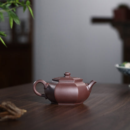 Artisan-made Yixing teapot with smooth yet powerful lines inspired by naturally weathered rocks