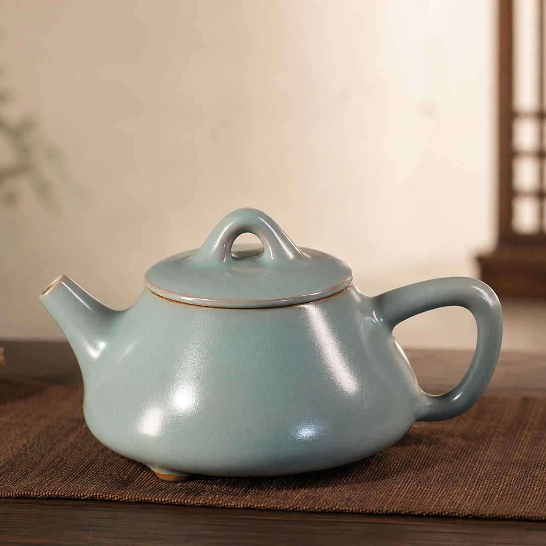 Handmade Ru Ware Shipiao teapot displaying jade-like matte glaze texture and subtle highlights