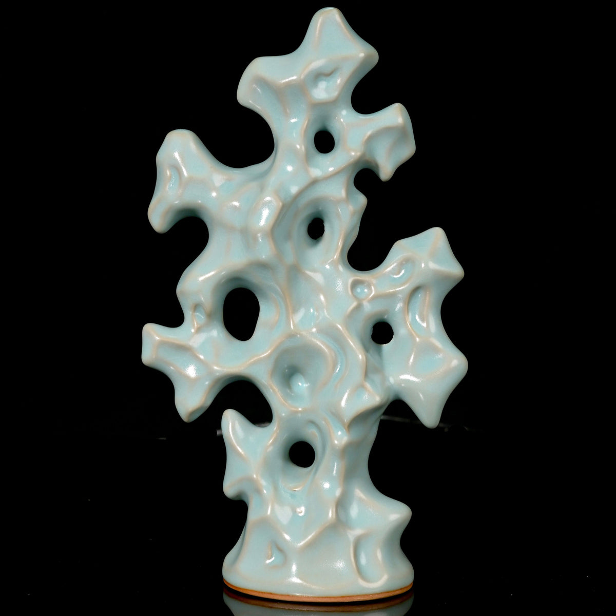 Ru Ware sky-blue glazed Scholar's Rock ceramic sculpture against dark background